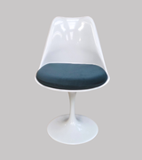 tulip swivel dining chair with dark green velvet cushion